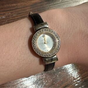 Ann Klein watch, opalesque face with small jewel, jeweled rim around watch face
